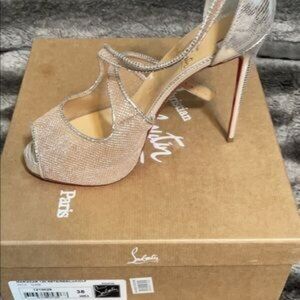 CHRISTIAN LOUBOUTIN HEEL